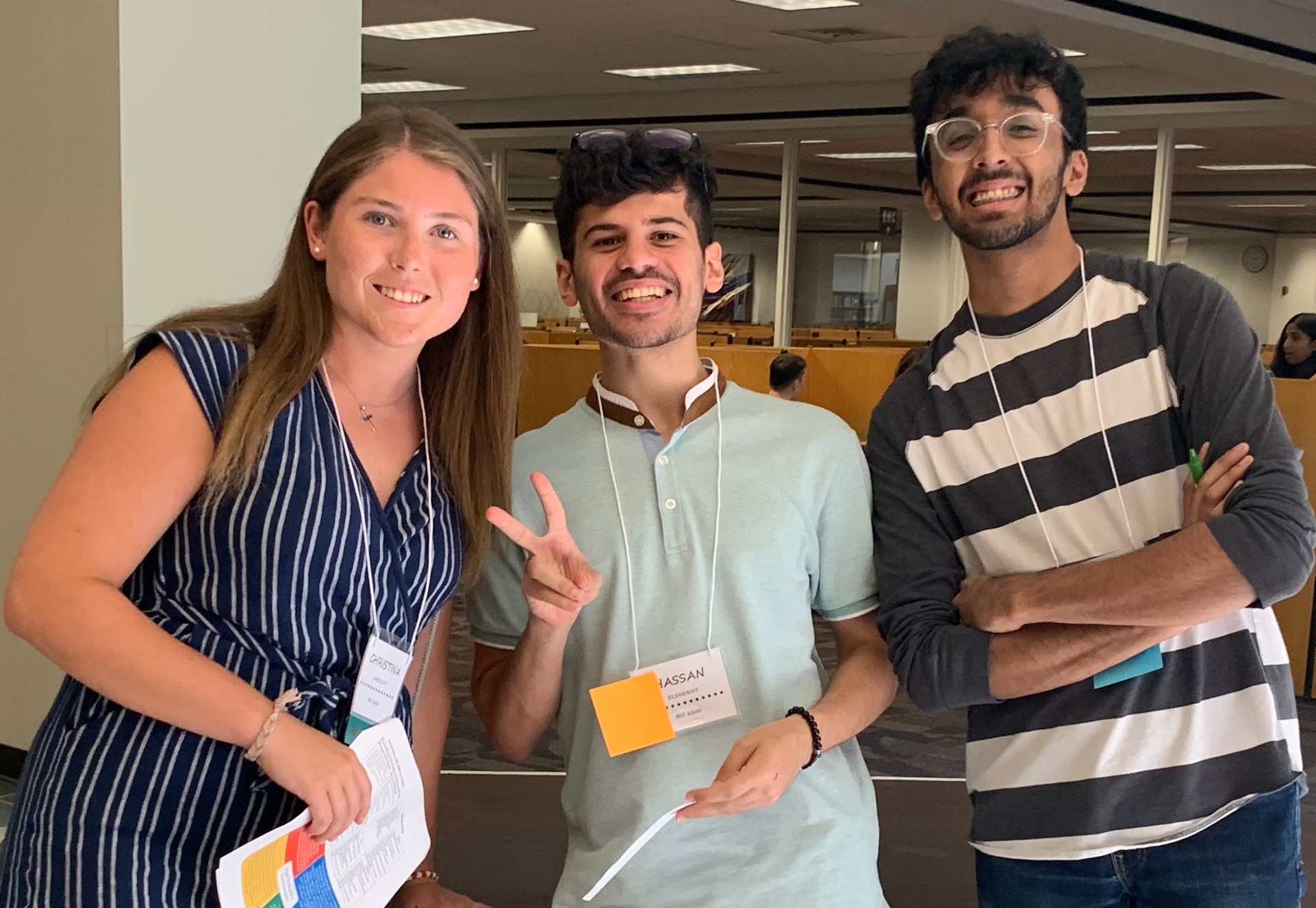 Three peer mentors at August 2019 training